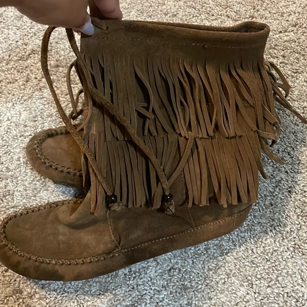 Selling these moccasin boots. They are in great condition.